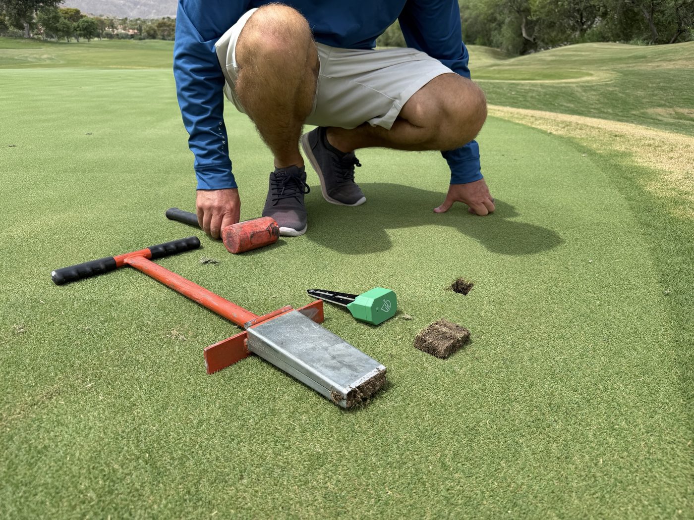 Installing a wireless soil sensor in a putting green with a cup cutter and mallet