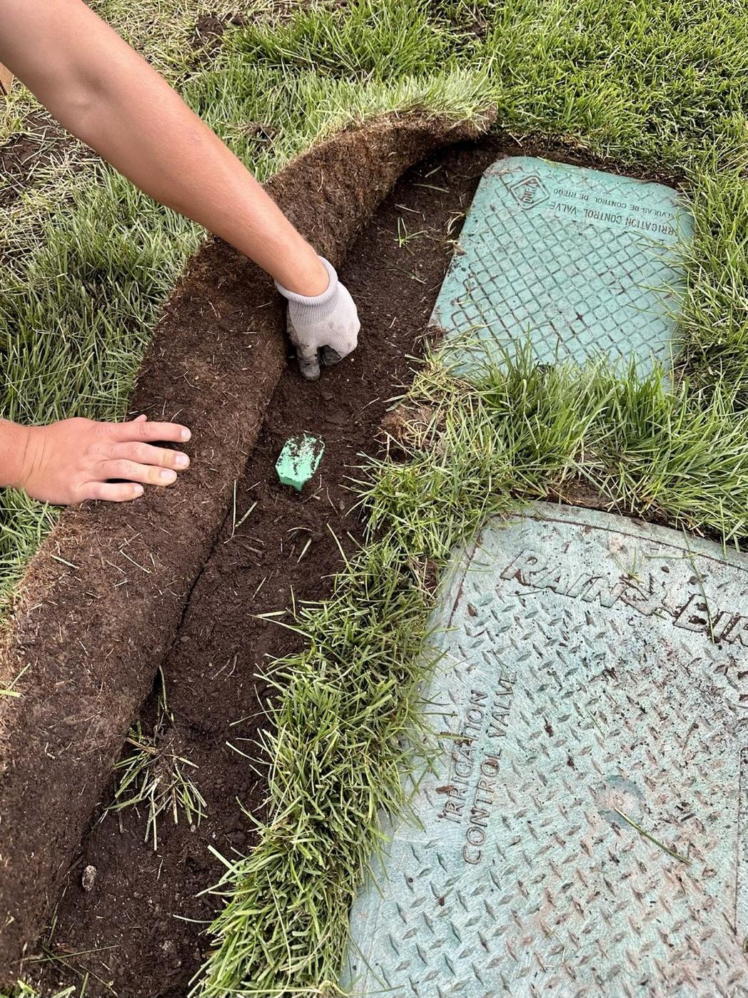 Installing a subsurface soil moisture sensor under turf